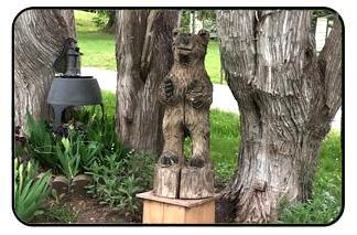 Bensfort Bridge Resort Photo Tour Carved Bear in Garden